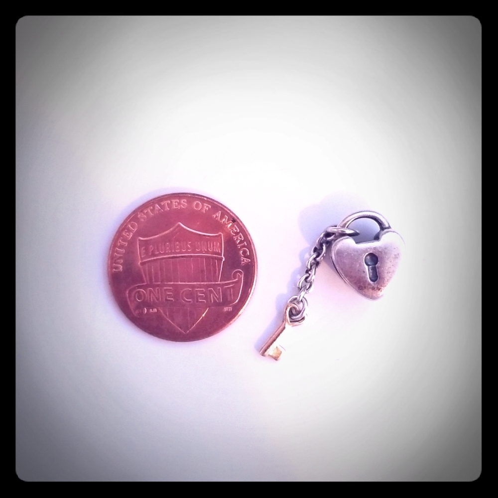 Heart and key charm